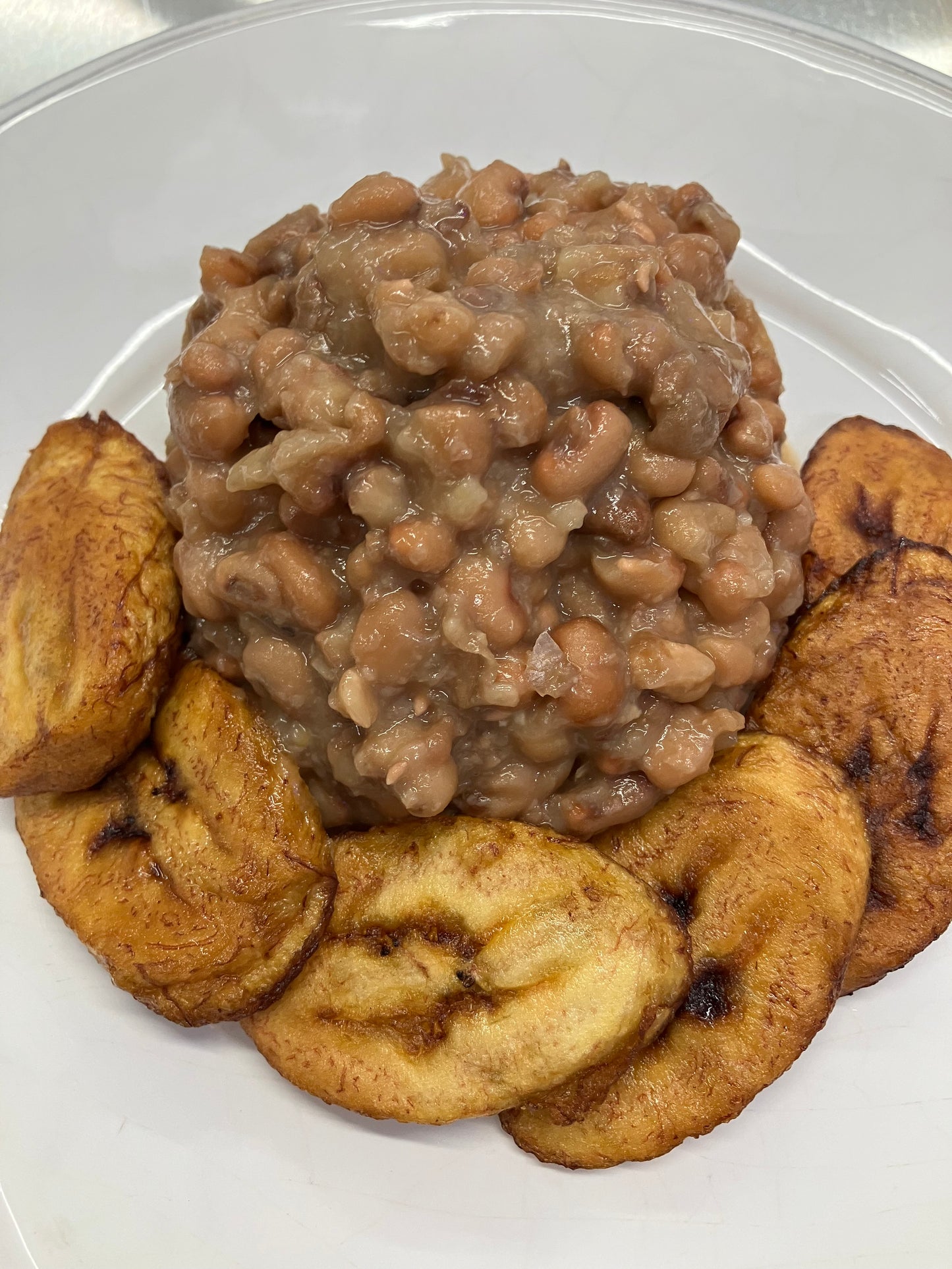 Beans and stew (Ewa Agoyin)